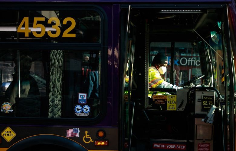 A Metro bus driver stops in the Chinatown-International District Wednesday, April 21, 2021. 
 216927