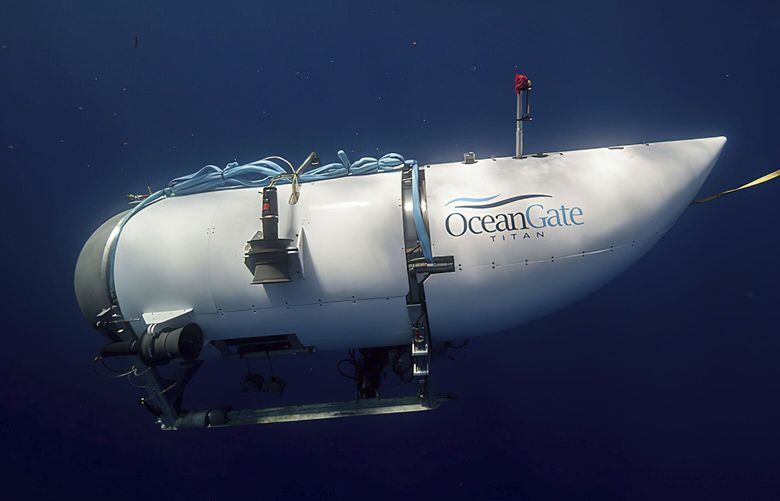 This photo provided by OceanGate Expeditions shows a submersible vessel named Titan used to visit the wreckage site of the Titanic. In a race against the clock on the high seas, an expanding international armada of ships and airplanes searched Tuesday, June 20, 2023, for the submersible that vanished in the North Atlantic while taking five people down to the wreck of the Titanic. (OceanGate Expeditions via AP) NYPS209 NYPS209 NYPS209