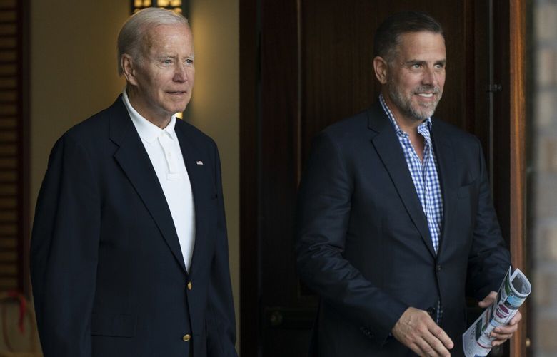 FILE – President Joe Biden and his son Hunter Biden leave Holy Spirit Catholic Church in Johns Island, S.C., after attending a Mass on Aug. 13, 2022. (AP Photo/Manuel Balce Ceneta, File) WX204 WX204