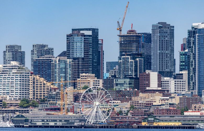 Seattle skyline as seen from the waters of Elliott Bay in Seattle, Washington on Friday afternoon on May 26, 2023.