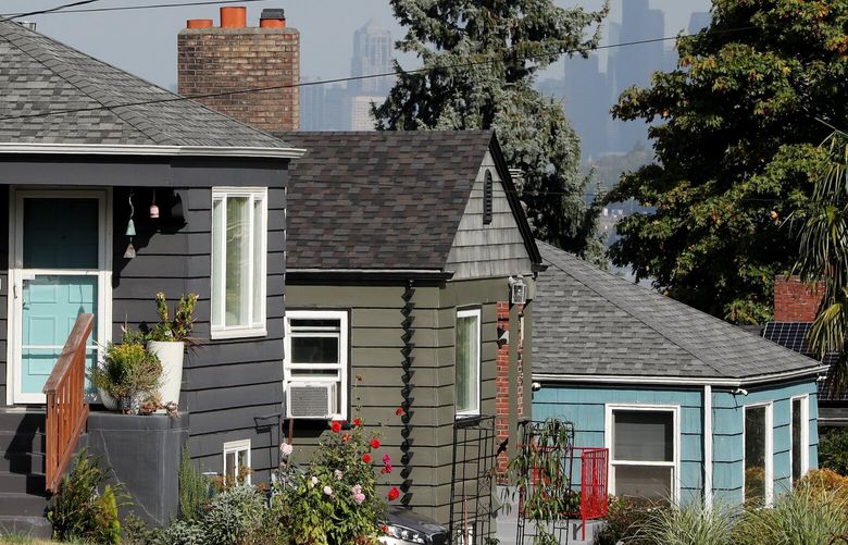 With downtown Seattle in the background, single family homes are seen Thursday, Sept. 23, 2021 in a King County census tract which includes Riverton-Boulevard Park. The FYIGuy reports: In 2010, just 15% of the people living in this area were born in another country. Census data for 2019 shows that number has jumped to 39%, which is the biggest increase of foreign-born population of any neighborhood in King County.
 218309