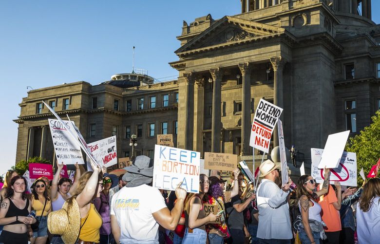 FILE — Abortion rights demonstrators in Boise, Idaho, June 25, 2022. A federal judge in Idaho blocked part of the state’s strict abortion ban on Wednesday, Aug. 24, delivering a limited but significant victory to the Biden administration, which has tried to use its limited power to protect reproductive rights since the Supreme Court overturned Roe v. Wade in June. (Angie Smith/The New York Times) XNYTF