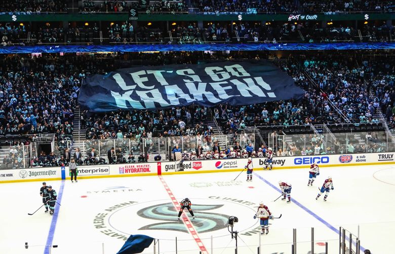 Kraken fans get ready for the third period. 223574