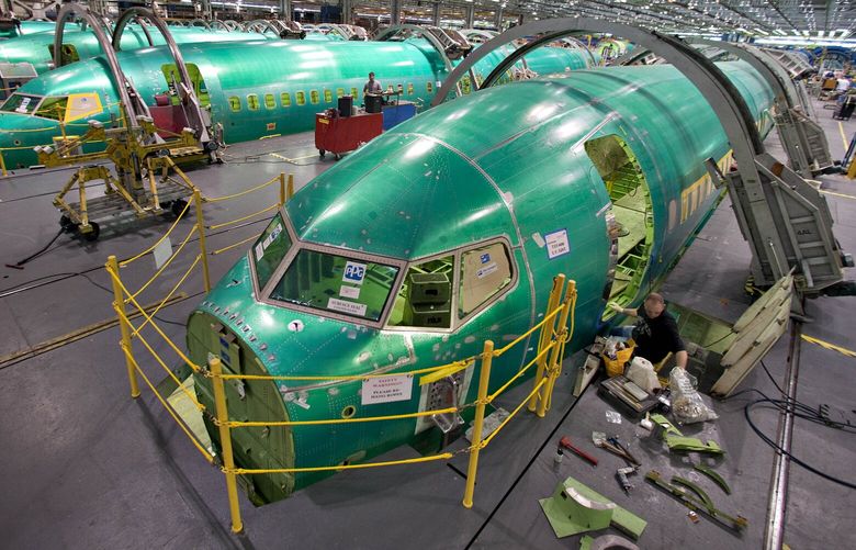 Boeing Co. 737 fuselage sections sit on the assembly floor at Spirit AeroSystems in Wichita, Kansas, U.S., on Thursday, March 11, 2010. Photographer: Daniel Acker/Bloomberg