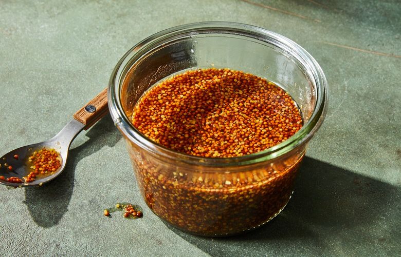 South Carolina mustard BBQ sauce in New York, May 31, 2023. A grainy mustard gives a new twist to this classic South Carolina-style sauce. Food styled by Monica Pierini. (Linda Xiao/The New York Times)