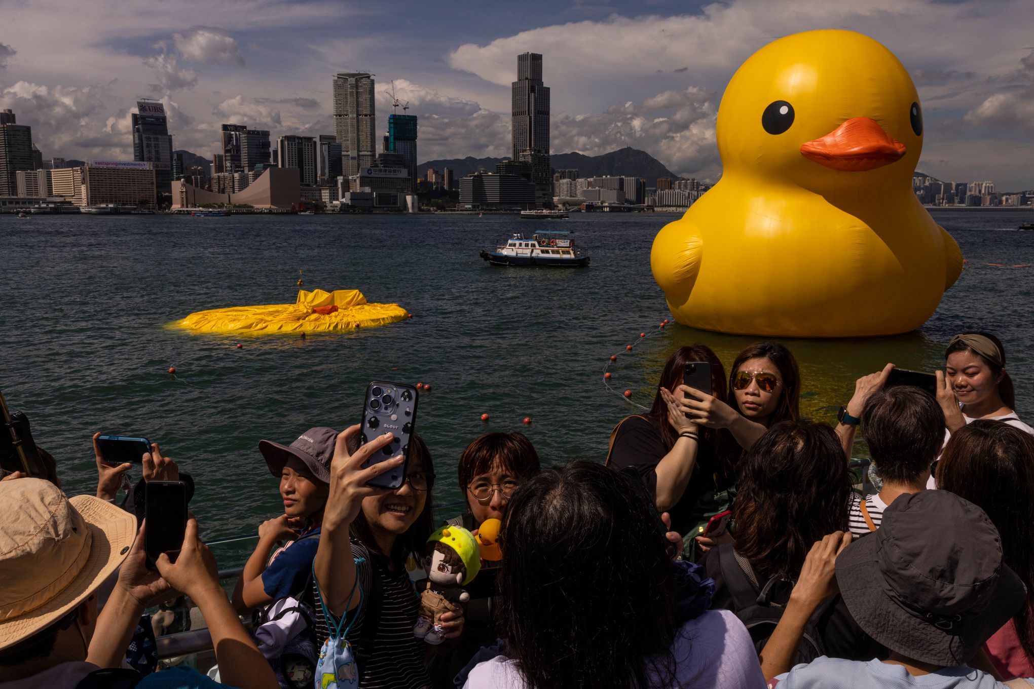 One of 2 giant ducks in Hong Kong's Victoria Harbor deflates