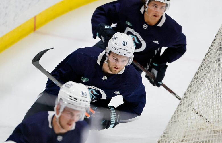 Last year’s first round draft pick Shane Wright (51) skates with his fellow prospects during camp on Sunday.  224318