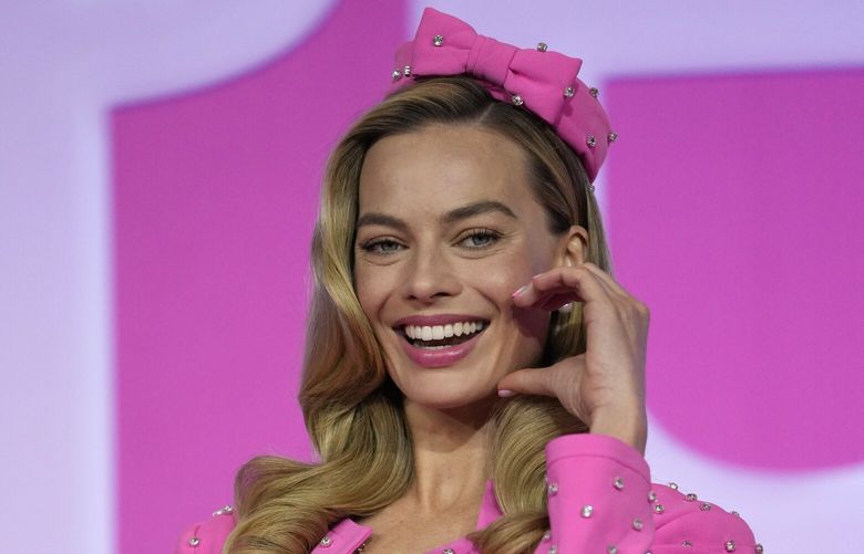 Margot Robbie poses for the media prior to a news conference of the movie “Barbie.” in Seoul, South Korea, Monday, July 3, 2023. The film is to be released in the country on July 19. (AP Photo/Lee Jin-man) LJM102 LJM102