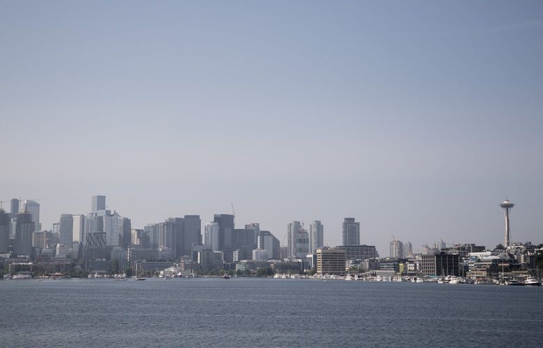 Haze sets in Wednesday, July 5, 2023, one the Seattle skyline.