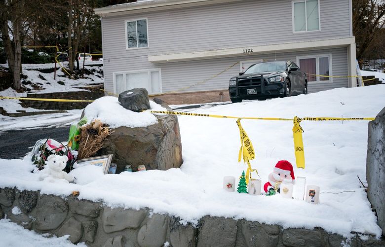 FILE — A small makeshift memorial outside the rental house where the four University of Idaho students were killed, in Moscow, Idaho on Dec. 30, 2022. The house in Idaho joins a growing roster of notorious properties around the country whose fates have become the subject of complex legal and ethical debates, as communities try to decide what, if anything, should remain in the aftermath of a mass murder. (Margaret Albaugh/The New York Times) XNYT0041 XNYT0041