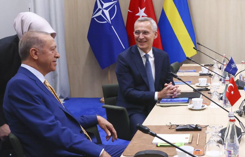 NATO Secretary General Jens Stoltenberg, center, speaks with Turkey’s President Recep Tayyip Erdogan, left, and Sweden’s Prime Minister Ulf Kristersson during a meeting ahead of a NATO summit in Vilnius, Lithuania, Monday, July 10, 2023. At left is an interpreter for Turkey’s President Recep Tayyip Erdogan. (Yves Herman, Pool Photo via AP) XVLM129 XVLM129