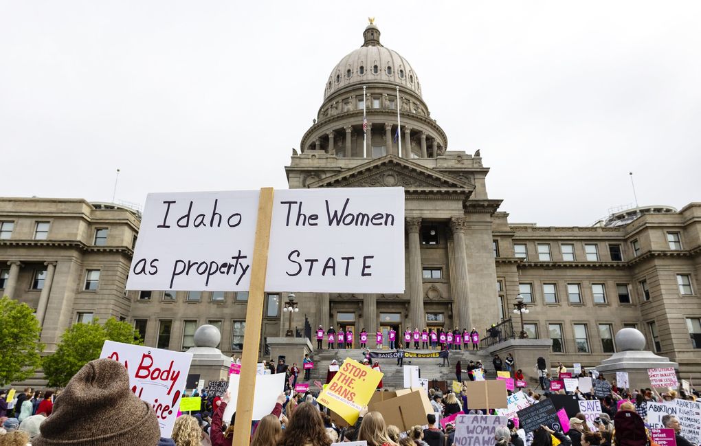 Protesters attend a Planned Parenthood rally for abortion rights outside of the Idaho Statehouse in downtown Boise, Idaho