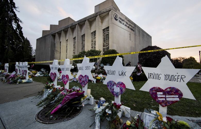 FILE – A makeshift memorial stands outside the Tree of Life Synagogue in the aftermath of a deadly shooting in Pittsburgh, Oct. 29, 2018. More than a week after convicting a gunman in the deadliest antisemitic attack in U.S. history, jurors will begin hearing arguments in federal court Monday, June 26, 2023, about whether he should receive the death penalty for killing 11 worshippers inside the Pittsburgh synagogue. (AP Photo/Matt Rourke, File) NYSS101 NYSS101