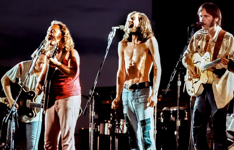 THEN: (online only): Crosby, Stills, Nash & Young (from left: Stephen Stills, David Crosby, Graham Nash and Neil Young) perform July 16, 1974, at Arizona’s Tempe Stadium.  

Stephen Stills, David Crosby, Graham Nash, & Neil Young @ Tempe Stadium, Tempe, AZ-7/16/74