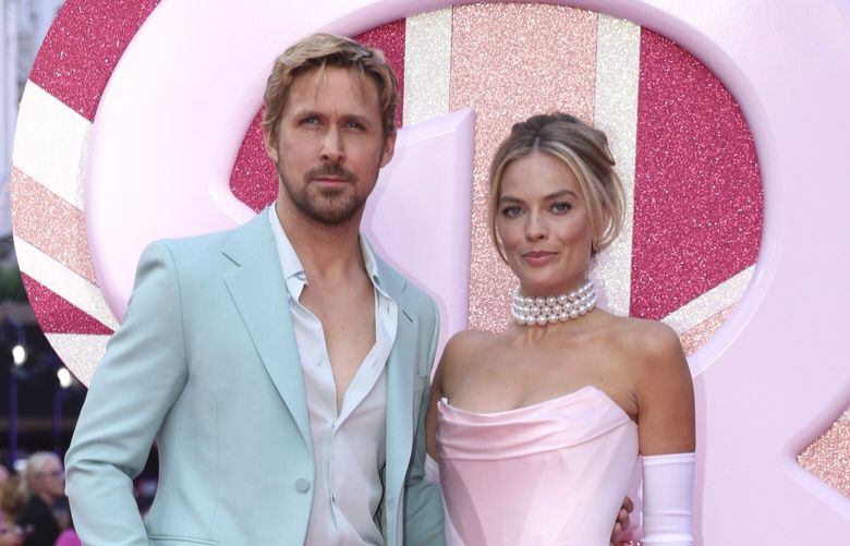 Ryan Gosling, left, and Margot Robbie pose for photographers upon arrival at the premiere of the film ‘Barbie’ on Wednesday, July 12, 2023, in London. (Vianney Le Caer/Invision/AP) LONAK348 LONAK348