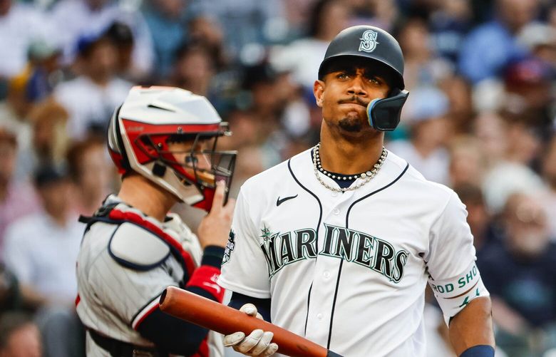 Julio Rodriguez heads back to the dugout after striking out in the fourth. 224491