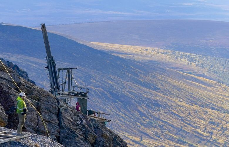 A miner takes in the view from a drilling site in Ambler Metal’s Arctic deposit area in the Ambler Mining District in Alaska on Sept. 6, 2022.