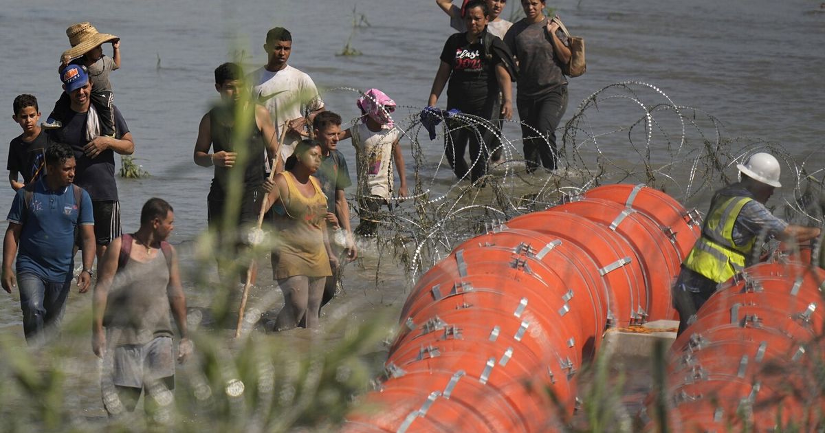 Biden administration sues Texas governor over Rio Grande buoy barrier ...