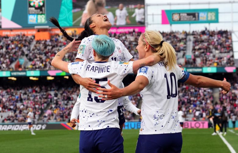 United States’ Lindsey Horan (10), Megan Rapinoe (15) and Sophia Smith top, celebrate after Horan scored their third goal during the second half of the Women’s World Cup Group E soccer match between the United States and Vietnam at Eden Park in Auckland, New Zealand, Saturday, July 22, 2023. (AP Photo/Abbie Parr) XDD256 XDD256