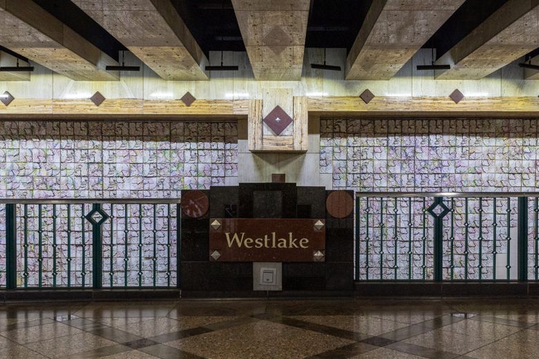 WESTLAKE STATION: The platforms and stone-faced mezzanine of Westlake Station are designed to mirror the retail district above ground. (Kevin Clark / The Seattle Times)