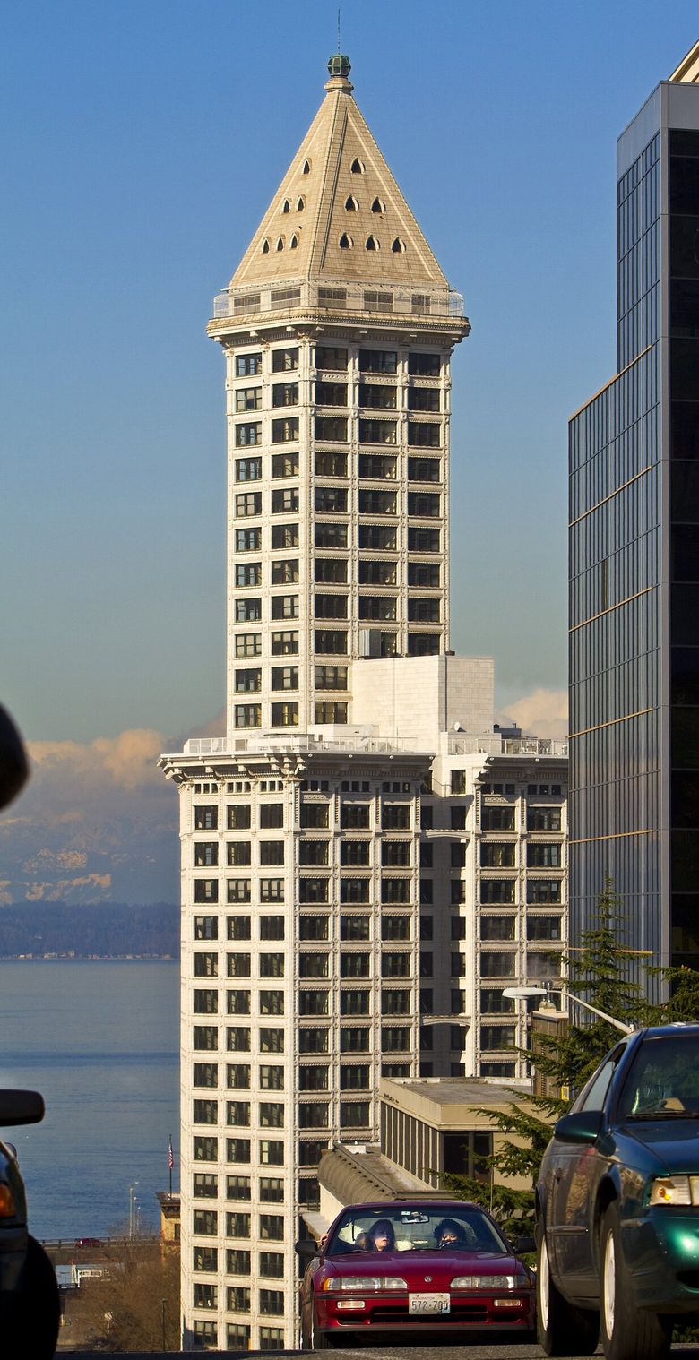 THE SMITH TOWER: The building&#8217;s steel frame is covered in white glazed terra cotta with a minimum of ornament and maximum expanses of windows with copper casings. (Mike Siegel / The Seattle Times, 2012)