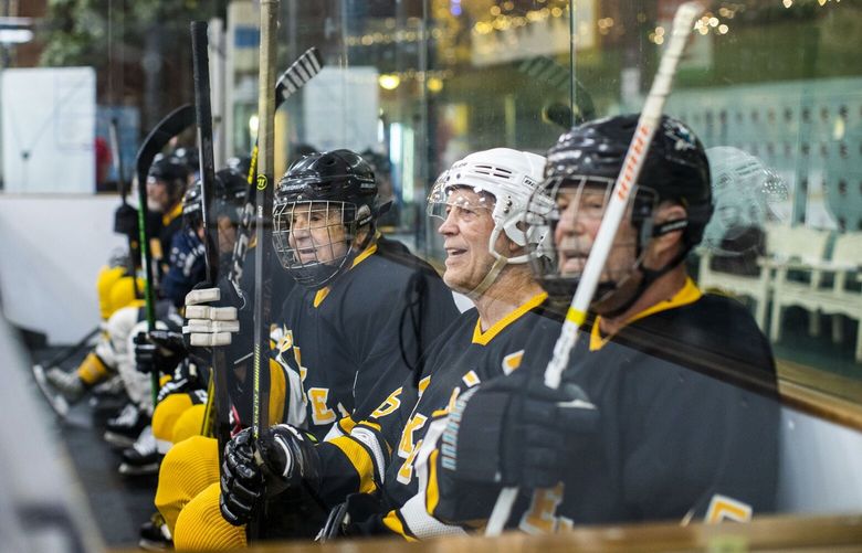 – EMBARGO: NO ELECTRONIC DISTRIBUTION, WEB POSTING OR STREET SALES BEFORE 12:01 A.M. ET ON MONDAY, JULY 24, 2023. NO EXCEPTIONS FOR ANY REASONS –   Terry Harper, second from right, who played on five Stanley Cup-winning teams during his 19 seasons in the National Hockey League, during the Snoopy Senior hockey tournament in Santa Rosa, Calif., July 13, 2023. The players, many in their 80s, may have titanium hips and implantable defibrillators, but they plan to play hockey until they go to that big locker room in the sky. (Bryan Meltz/The New York Times) XNYT0616 XNYT0616