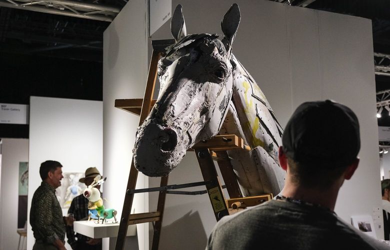 “Horse” is by artist Scott Fife, and features archival cardboard, dry screws, glue, ink and pencil markings; and is featured in the Traver Gallery. 224536