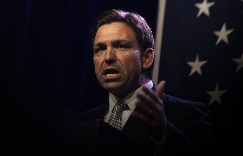 Gov. Ron DeSantis of Florida addresses the 2023 Iowa Republican Party Lincoln Dinner in Des Moines, on Friday, July 28, 2023. Donald Trump and DeSantis shared the same stage as candidates for the first time here on Friday, along with a number of other Republican presidential primary hopefuls. (Jordan Gale/The New York Times)

 XNYT0836 XNYT0836