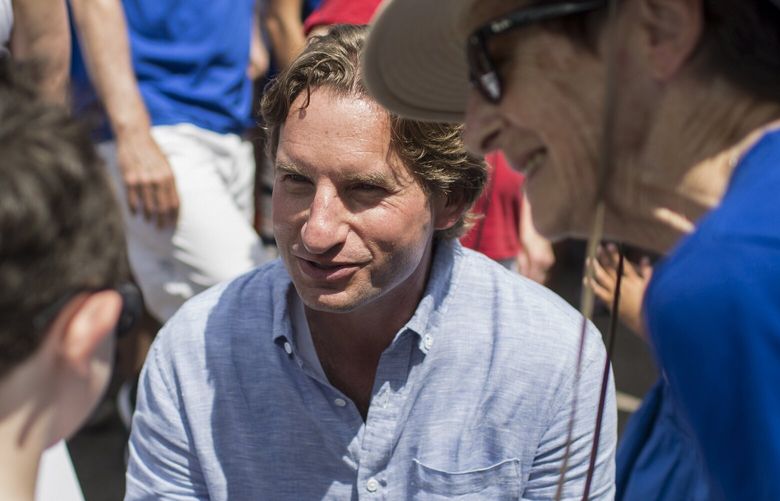 FILE —Dean Phillips, then a candidate for the 3rd Congressional district in Minnesota, greeting campaign volunteers in Chaska, Minn. on July 29, 2018. Rep. Dean Phillips (D-Minn.), who has for months been saying in public what many in his party only whisper in private — that the 80-year-old President Biden should not seek re-election because of his age — said he was considering challenging Biden in next year’s primary. (Jenn Ackerman/The New York Times)