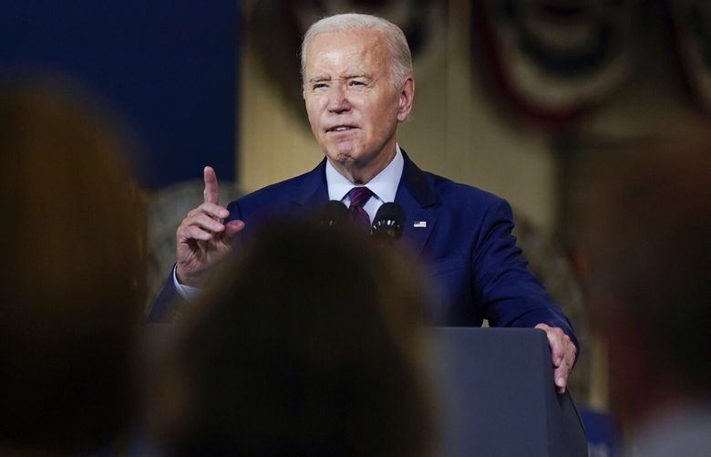 President Joe Biden speaks at Auburn Manufacturing Inc., in Auburn, Maine, Friday, July 28, 2023, before he signs an executive order to encourage companies to manufacture new inventions in the United States. (AP Photo/Charles Krupa) MECK116 MECK116