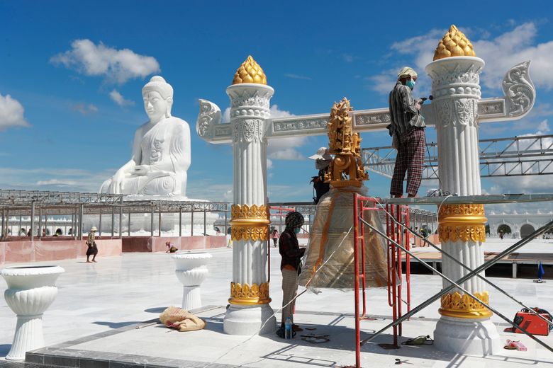 Myanmar's generals unveil giant Buddha statue as they seek to win hearts  and minds during civil war