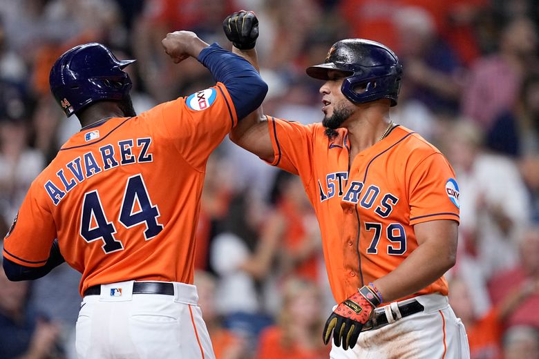 Altuve breaks out with 3 hits to help Astros even Fall Classic