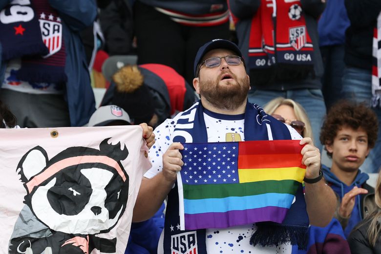June 29, 2019: A fan holds up a pride scarf during the national
