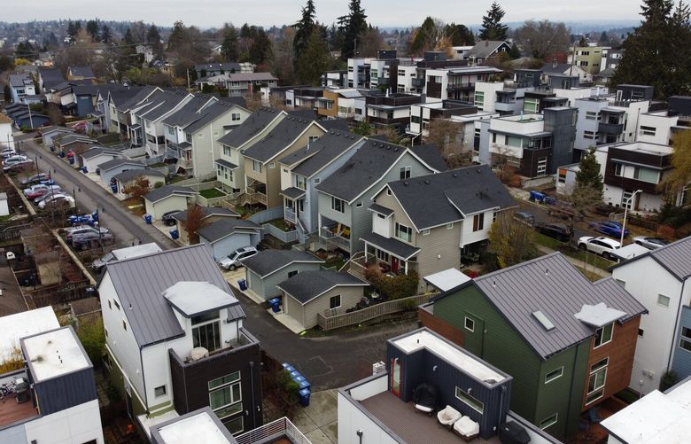 (FOR 2023 REAL ESTATE PREDICTIONS STORY) Rainier Vista homes near the Columbia City neighborhood in South Seattle are seen from the air, Tuesday, Dec. 13, 2022.