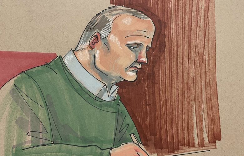 Defendant Robert Bowers takes notes during a sentencing hearing that will determine if he gets a life sentence or the death penalty, in Pittsburgh federal court on Monday, July 31, 2023. Jurors are expected to begin deliberations early Tuesday in the 2018 attack that killed 11 worshippers. (Dave Klug via AP) NYJO253 NYJO253