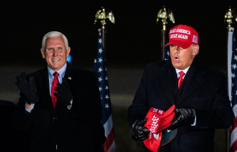 President Donald Trump and Vice President Mike Pence arrive at a rally in Grand Rapids, Mich., on Nov. 2, 2020. MUST CREDIT: Washington Post photo by Salwan Georges