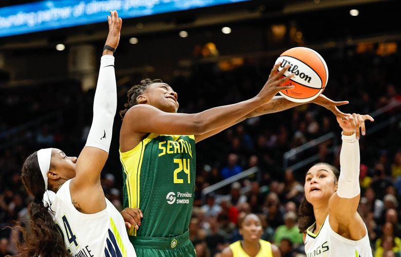 Jewell Loyd is unable to fight off the double team in the low post by Dallas’ Arike Ogunbowale (24) and Satou Sabally (0) in the second quarter. 224567