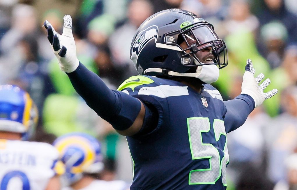 Seahawks LB Darrell Taylor leaves on stretcher with injury