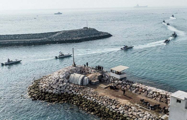 In this photo released Wednesday, Aug. 2, 2023, by Sepahnews of the Iranian Revolutionary Guard, the Guard’s speedboats move during a drill in the Persian Gulf. Iran’s paramilitary Revolutionary Guard launched a surprise military drill Wednesday on disputed islands in the Persian Gulf, just as the U.S. military increase its presence in the region over recent ship seizures by Tehran. (Sepahnews via AP) VAH105 VAH105