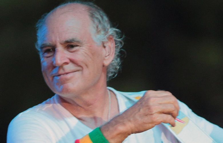 Jimmy Buffett performs at his sister’s restaurant in Gulf Shores, Ala., Wednesday, June 30, 2010. Buffet postponed his free concert on the beach Thursday night because of the possibility of bad weather spawned by Hurricane Alex.   (AP Photo/Dave Martin) ALDM118