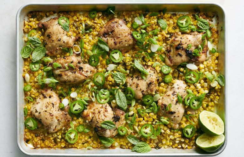 Sheet-pan chicken thighs with spicy corn. Marinate your chicken thighs in pickled jalape–o brine, then toss the peppers with fresh summer corn and lime for a dinner that’s spicy, sweet, salty and sour. Food Stylist: Simon Andrews (David Malosh/The New York Times) XNYT0813