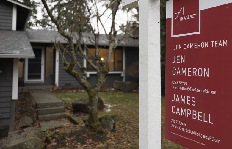 For sale sign in front of the home that Jen Cameron, managing broker at The Agency and her business partner, broker James Campbell, have had listed on the market since mid-October.  Shot Friday, December 2, 2022.  The housing market is still cooling, particularly on the Eastside.
 222378
