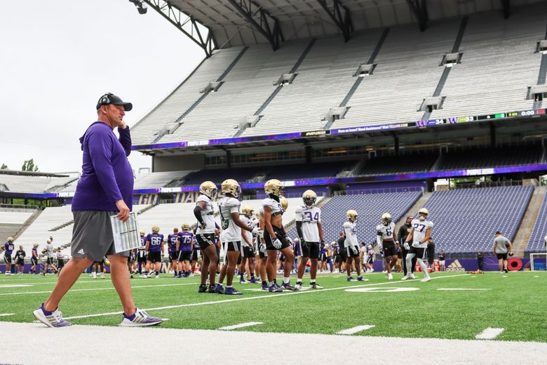 Why do the Washington Huskies wear their jersey numbers? 'No. 1