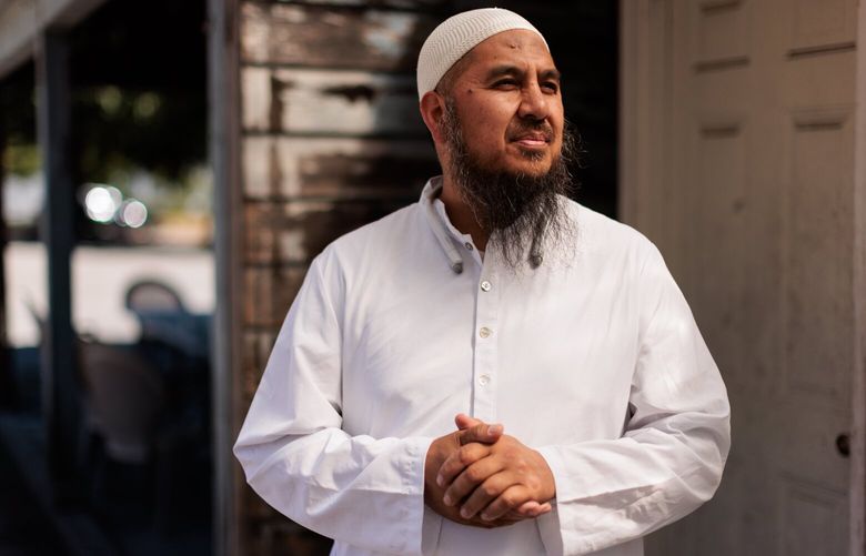 Imam Farid Sulayman stands for a portrait in Seattle’s Rainier Valley neighborhood. 224505