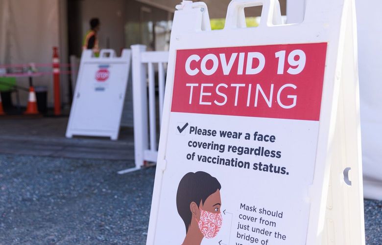 Grant Natzke, medical assistant lead, works at the University of Washington COVID-19 testing location at 4113 Franklin Pl NE in Seattle Wednesday, May 10, 2023. 
 223812