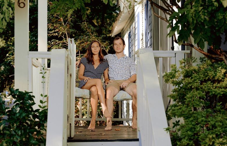 Whitney Buehler and her husband, Joey, at their home in Atlanta on July 6. For some young people, a path to homeownership often involves a mix of diligent saving combined with assistance from family or government loans and programs. (Peyton Fulford / The New York Times) 