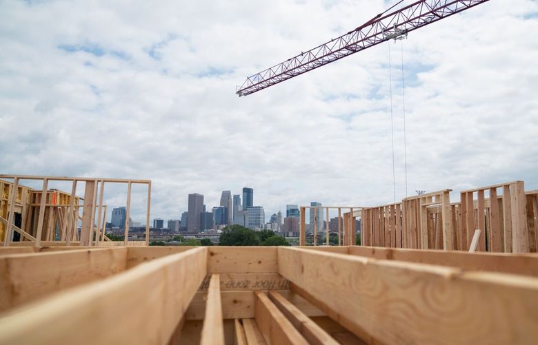 The Currie Commons housing development under construction in the Harrison neighborhood of Minneapolis, Minnesota, US, on Thursday, July 20, 2023. The Minneapolis area has seen an increase in rental units, thanks to a regional effort that included new zoning rules.
