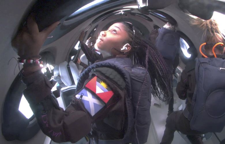 This photo provided Virgin Galactic shows passengers during Virgin Galactic’s first space tourism flight on Thursday Aug. 10, 2023.  Virgin Galactic rocketed to the edge of space with its first tourists Thursday. The space plane glided back to a runway landing at Spaceport America in the New Mexico desert, after a brief flight that gave passengers a few minutes of weightlessness.(Virgin Galactic via AP) NY125 NY125