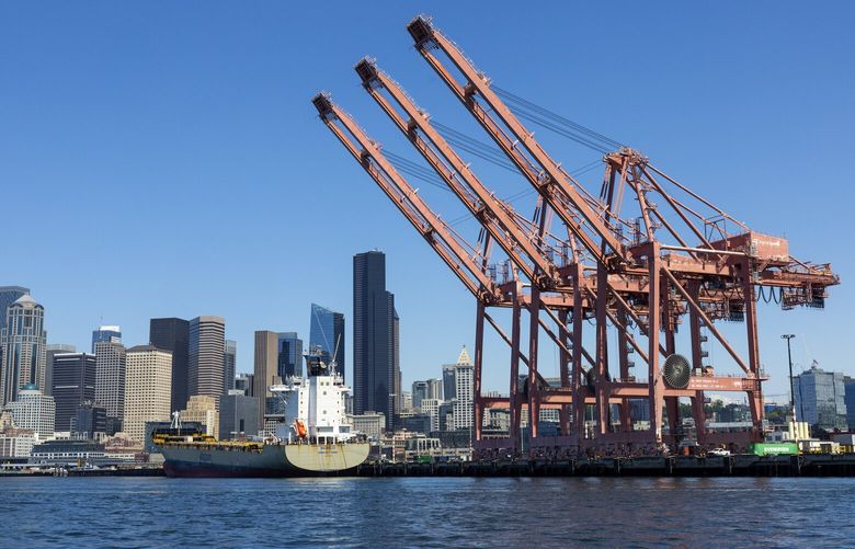 Port of Seattle cranes await a ship on east Duwamish Waterway in Seattle, Washington on Friday afternoon on May 26, 2023. 
