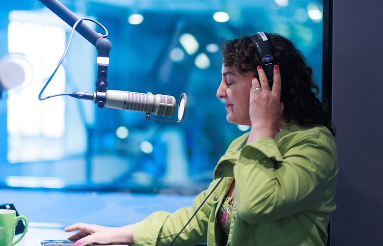 Jazz host Paige Hansen works at KNKX’s new Seattle studios, located between the Seattle waterfront and historic Pike Place Market on Western Avenue. 224584